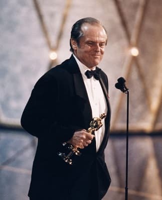 Jack Nicholson holds his Best Actor Oscar